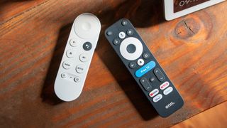 Onn Google TV 4K Pro remote next to Chromecast with Google TV remote